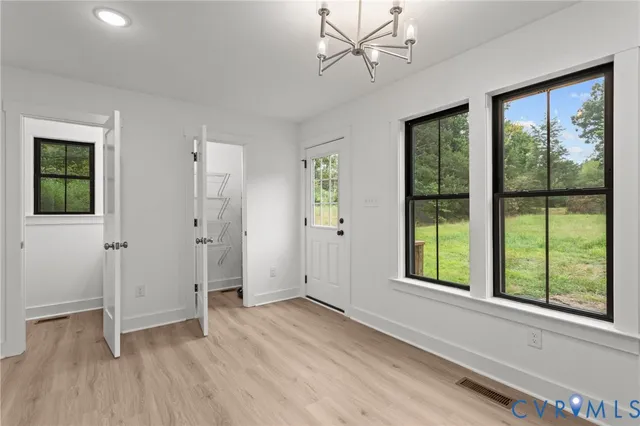 a bathroom with a sink vanity and a mirror