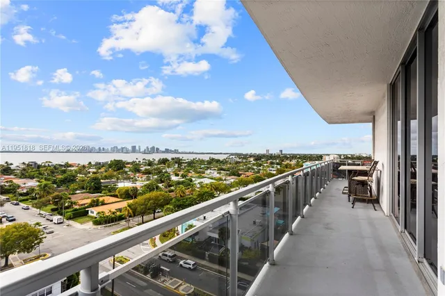 a view of a workspace with furniture