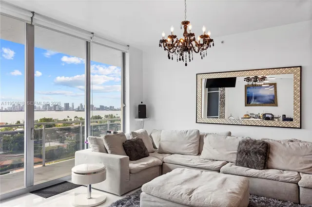 a view of a swimming pool with an outdoor seating