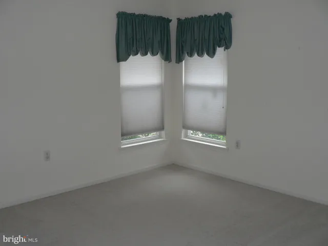 a view of a room with a window