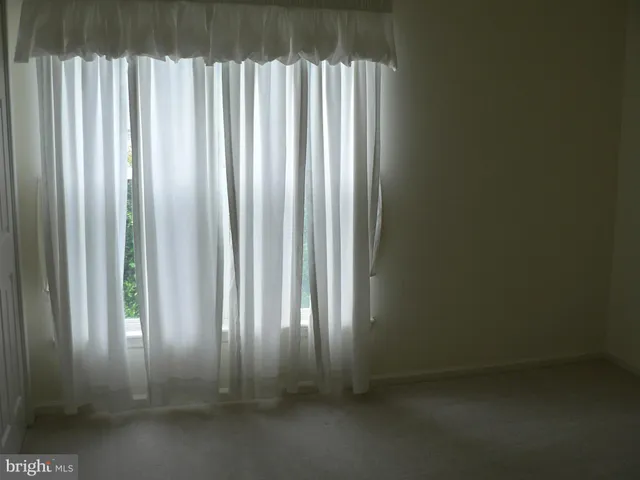 a view of a utility room with a window