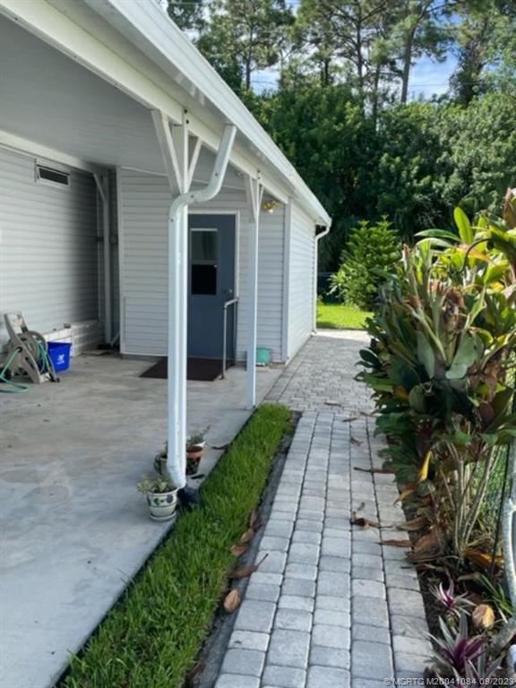 2526 Southwest Olds Place Stuart, FL 34997 - Photo 11 of 11 a view of a back yard of the house