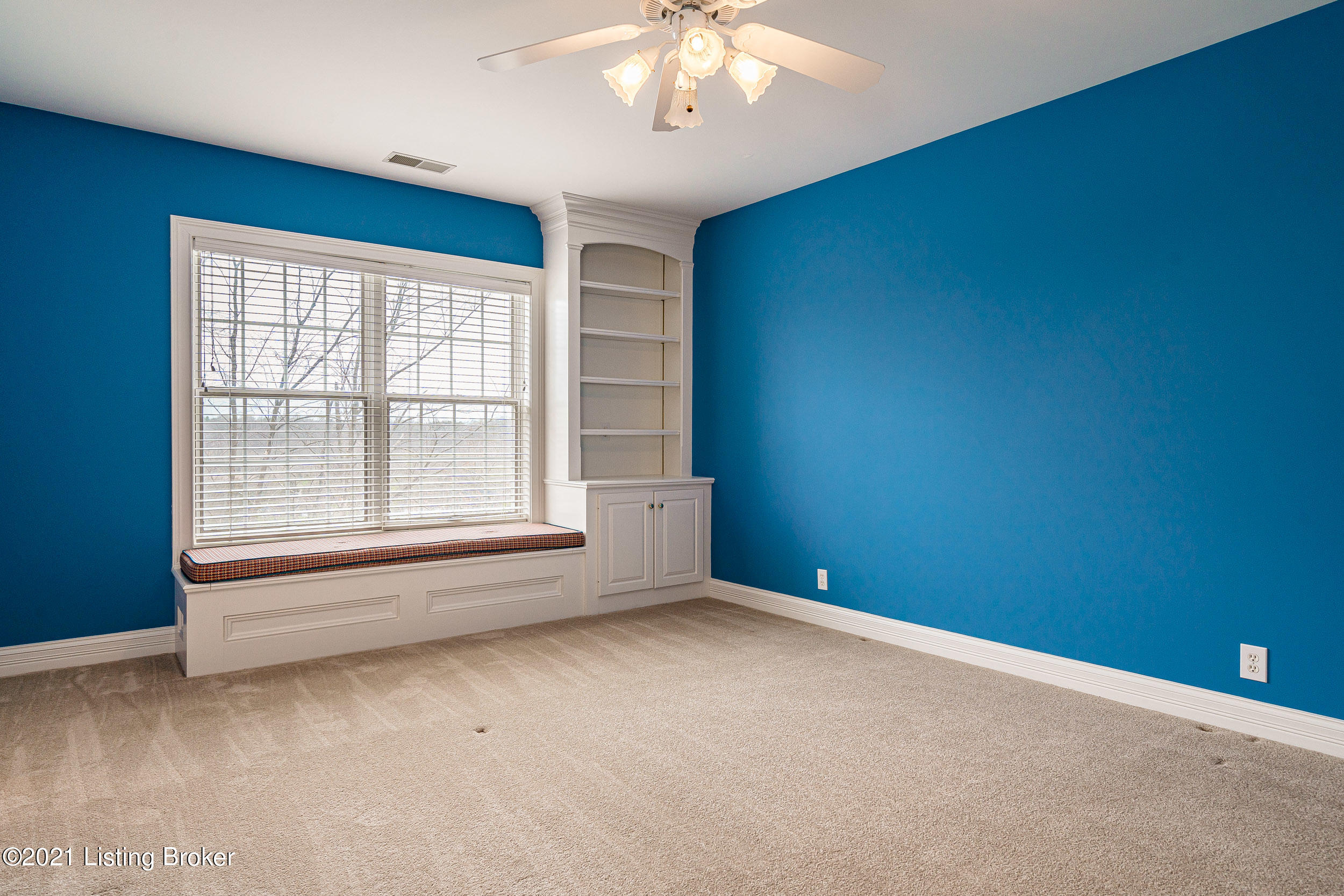 15301 Deer Run Road Louisville, KY 40299 - Photo 29 of 95 Bedroom 3 features a window seat, built in bookcase, and walk-in closet