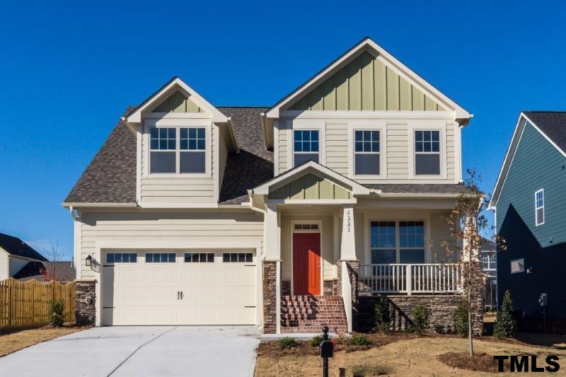 4221 Fares Wall Court Raleigh, NC 27616 - Photo 1 of 25 a front view of a house with a yard