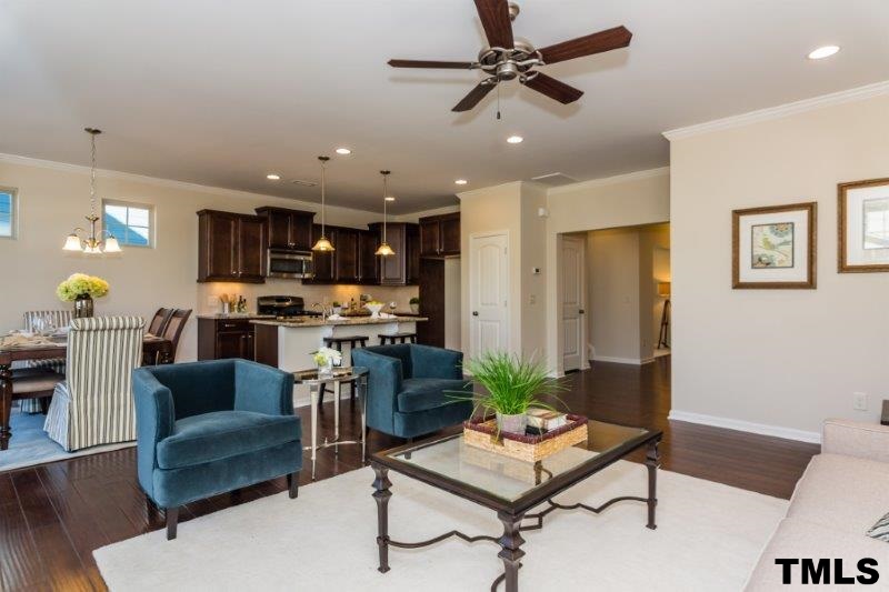 4221 Fares Wall Court Raleigh, NC 27616 - Photo 12 of 25 a living room with furniture and kitchen view