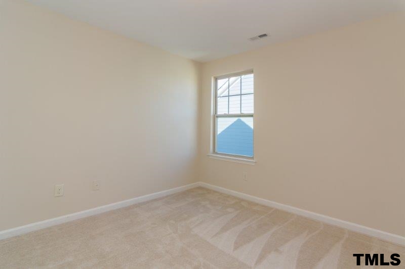 4221 Fares Wall Court Raleigh, NC 27616 - Photo 22 of 25 an empty room with windows