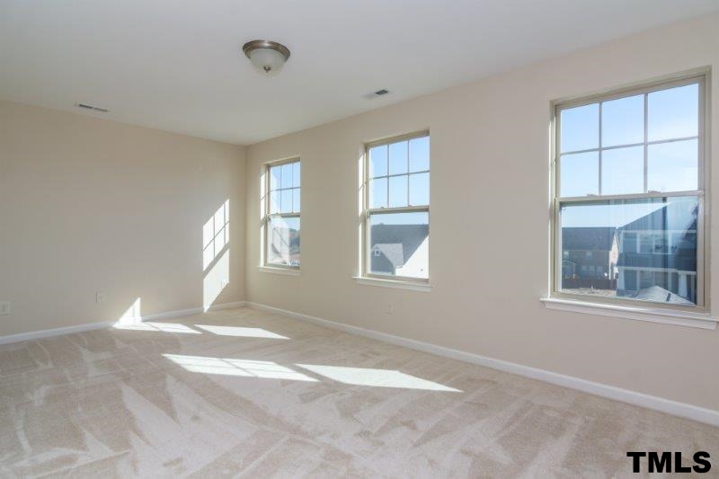 4221 Fares Wall Court Raleigh, NC 27616 - Photo 23 of 25 a view of an empty room with a window