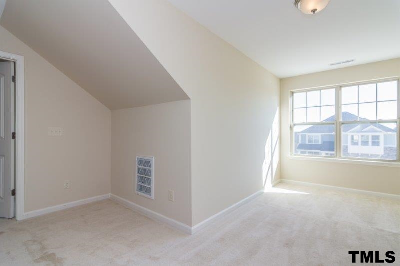 4221 Fares Wall Court Raleigh, NC 27616 - Photo 24 of 25 an empty room with windows