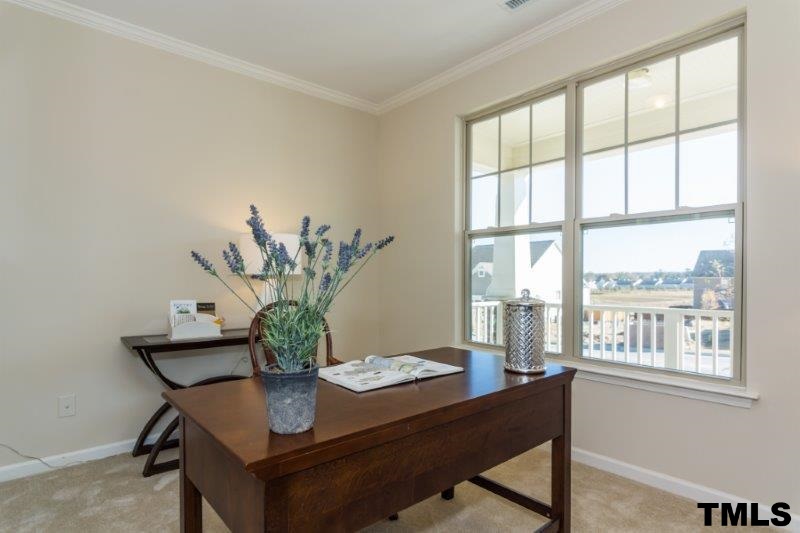 4221 Fares Wall Court Raleigh, NC 27616 - Photo 3 of 25 a view of a workspace with a window
