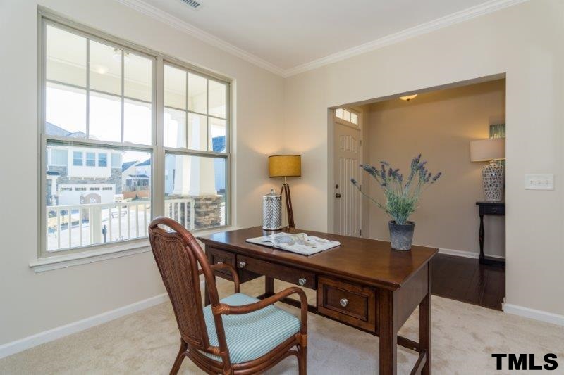 4221 Fares Wall Court Raleigh, NC 27616 - Photo 4 of 25 a view of a dining room with furniture and window