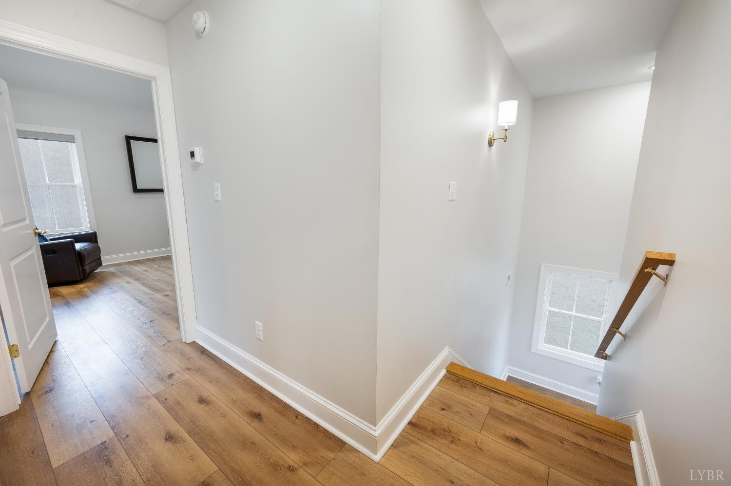 240 Ned Brown Road Amherst, VA 24521 - Photo 23 of 53 a view of hallway with wooden floor