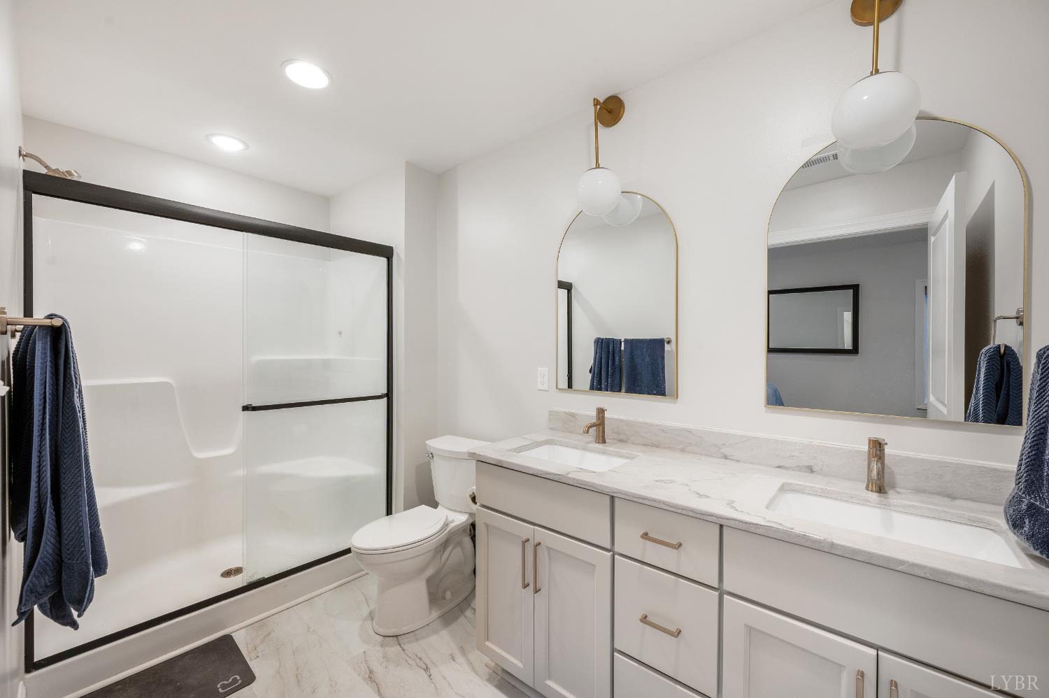 240 Ned Brown Road Amherst, VA 24521 - Photo 27 of 53 a bathroom with double vanity sink and a shower