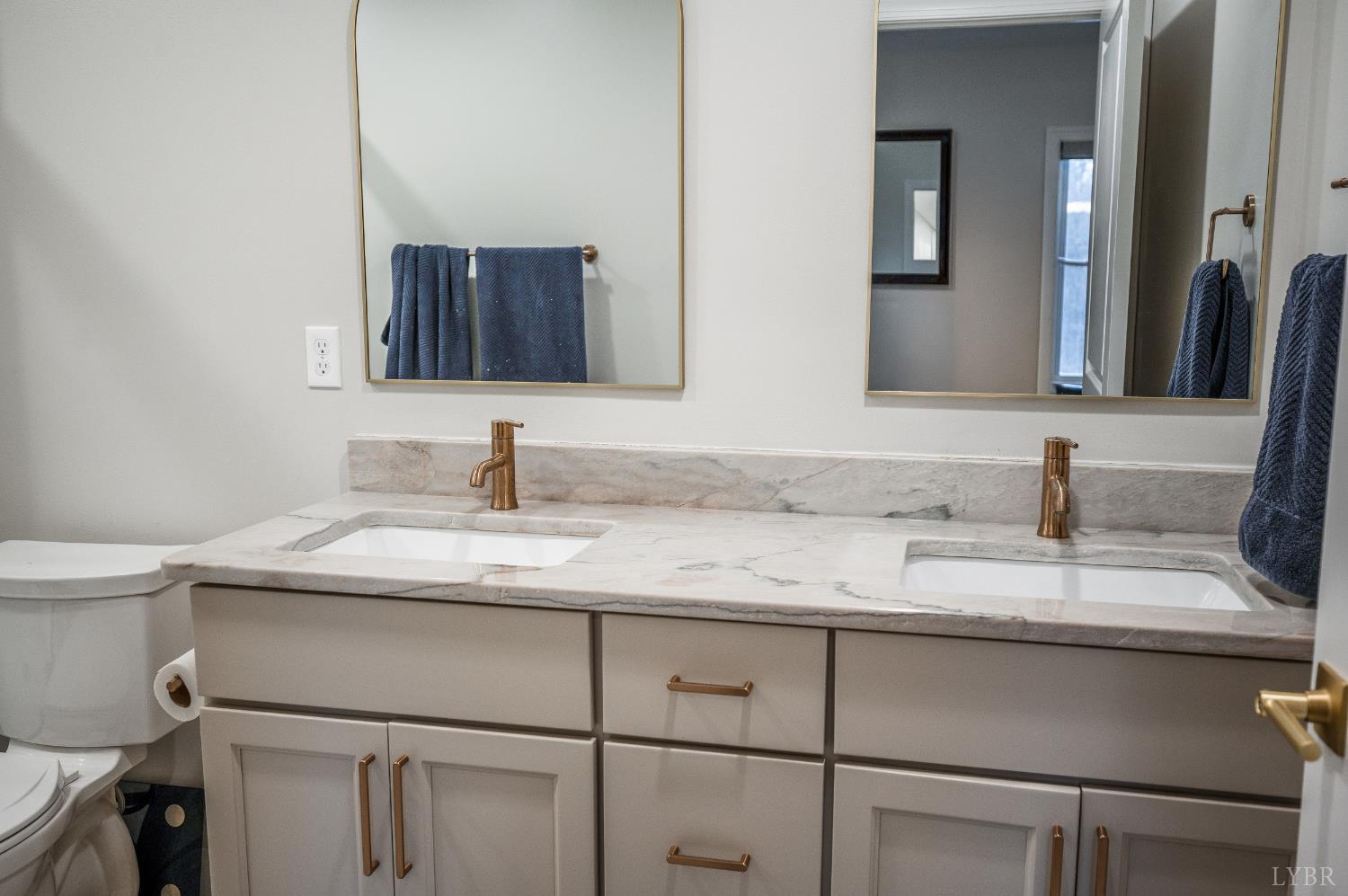 240 Ned Brown Road Amherst, VA 24521 - Photo 28 of 53 a bathroom with a granite countertop sink and a mirror