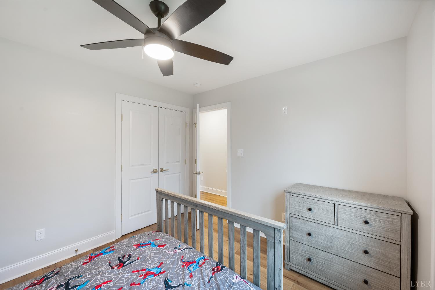 240 Ned Brown Road Amherst, VA 24521 - Photo 32 of 53 a bedroom with furniture and a baby crib