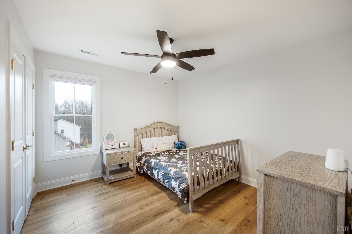 240 Ned Brown Road Amherst, VA 24521 - Photo 36 of 53 a bedroom with a bed and a window