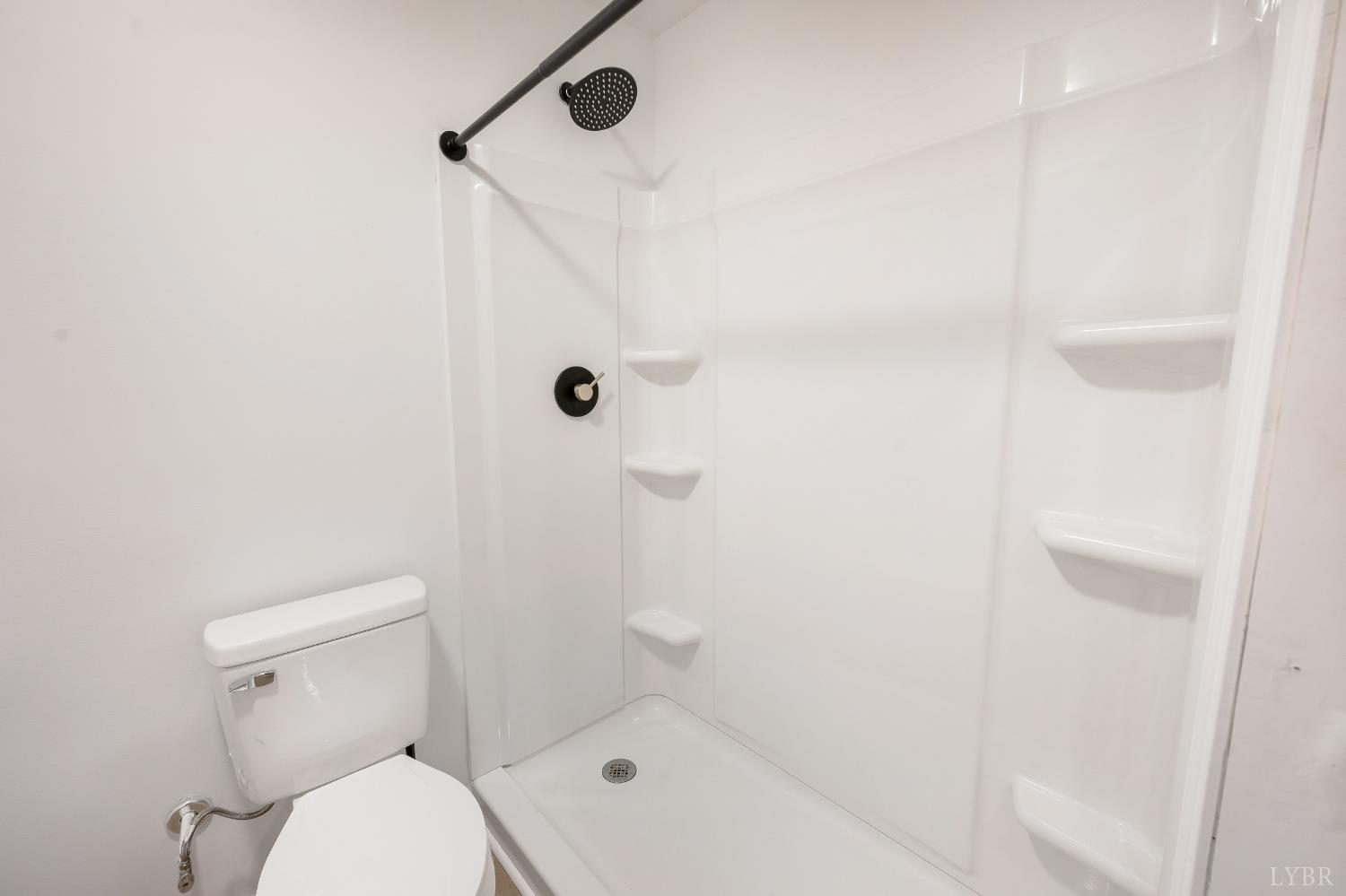 240 Ned Brown Road Amherst, VA 24521 - Photo 41 of 53 a bathroom with a toilet and a shower
