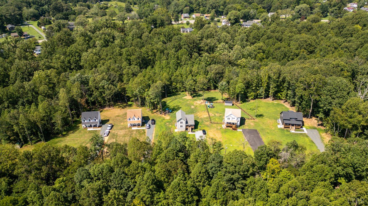 240 Ned Brown Road Amherst, VA 24521 - Photo 48 of 53 an aerial view of residential house with outdoor space and trees all around