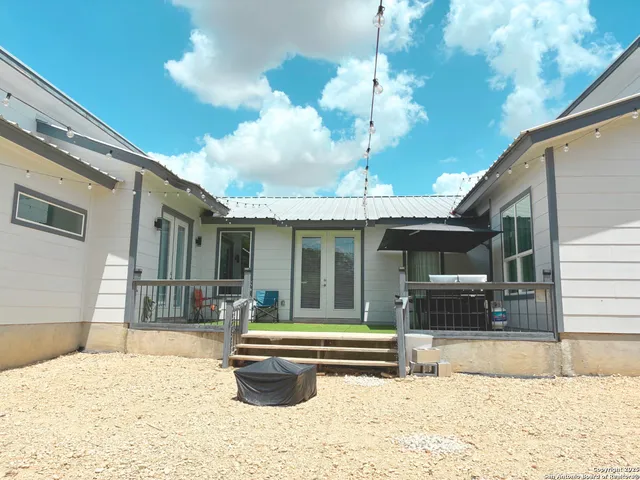a view of a house with a swimming pool