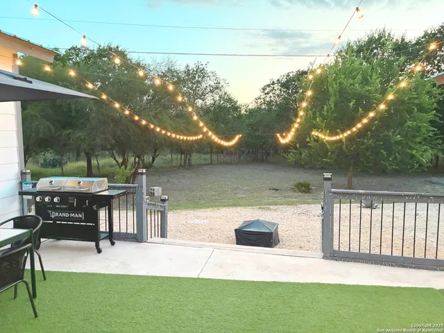 a view of outdoor space yard deck and outdoor kitchen