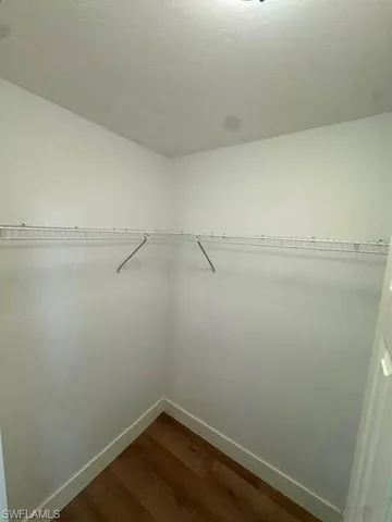 a view of a room with racks on the wall