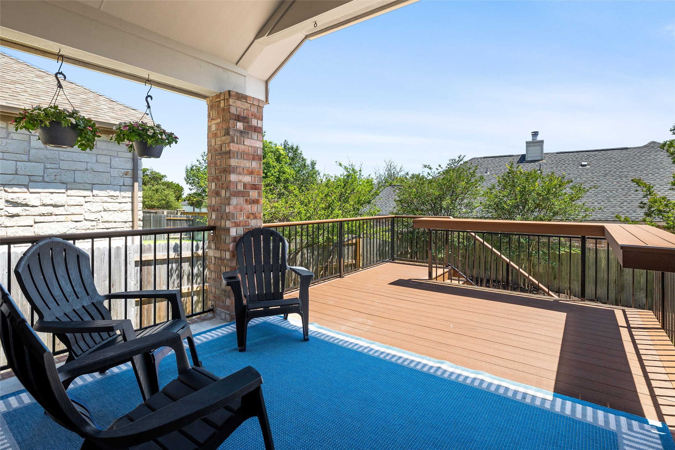 100 Stratton Court Austin, TX 78737 - Photo 28 of 38 Outside is a covered patio and recently added TimberTech deck.
