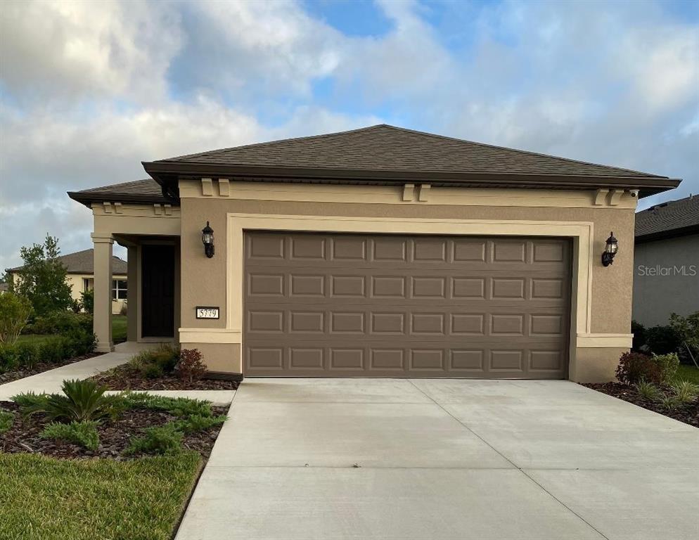 5779 Southwest 87th Ct Road Ocala, FL 34481 - Photo 1 of 1 a front view of a house