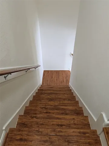 a view of hallway with stairs