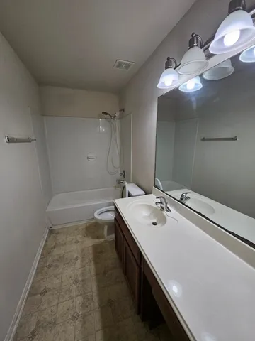 a bathroom with a bath tub and a shower