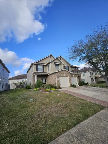 a house view with a outdoor space
