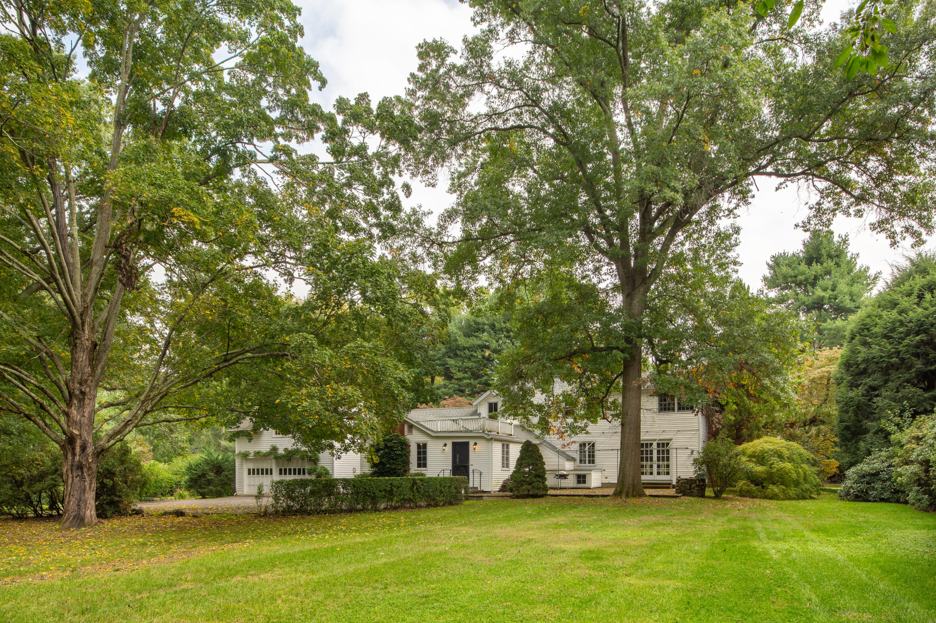 275 Hollow Tree Ridge Road Darien, CT 06820 - Photo 10 of 41 a view of house with yard