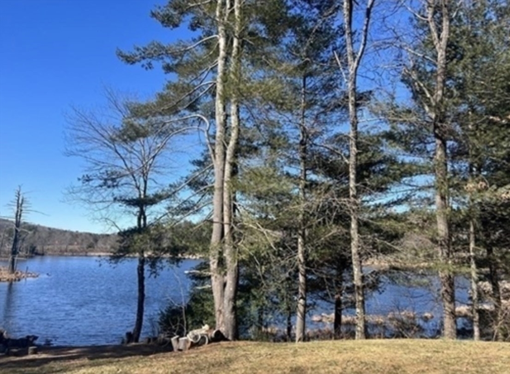 1124 Bemis Road, Unit A Warren, MA 01585 - Photo 31 of 33 a view of a house with a tree