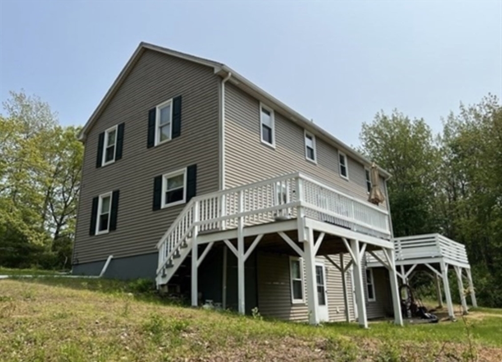 1124 Bemis Road, Unit A Warren, MA 01585 - Photo 5 of 33 a view of a house with a yard