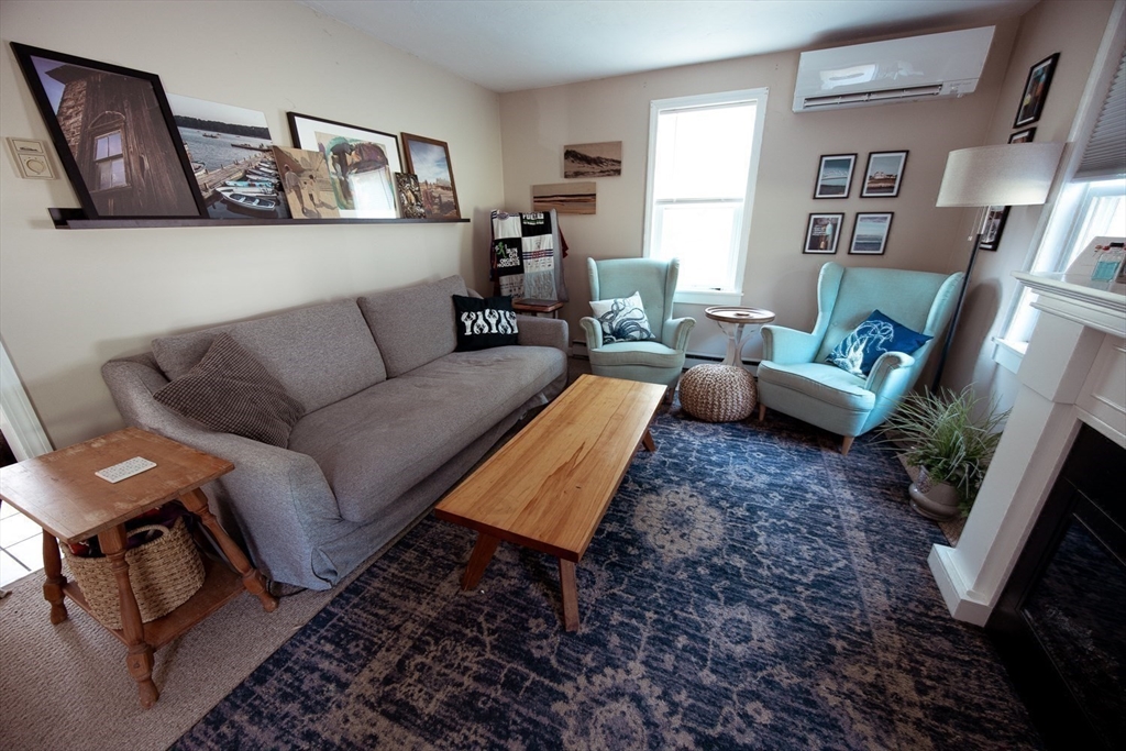 1124 Bemis Road, Unit A Warren, MA 01585 - Photo 9 of 33 a living room with furniture and a couch
