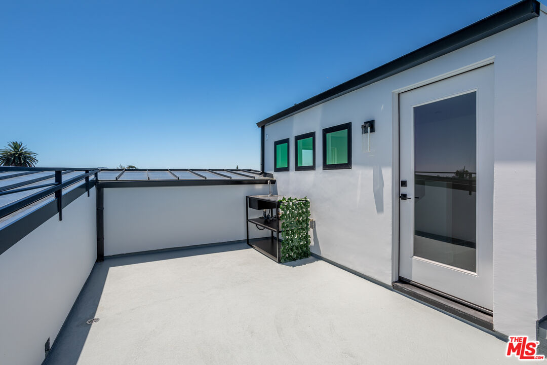 1573 Hi Point Street Los Angeles, CA 90035 - Photo 11 of 56 a view of a house with backyard