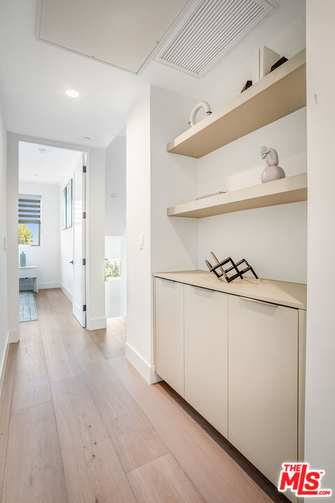 1573 Hi Point Street Los Angeles, CA 90035 - Photo 30 of 56 a view of an entryway with wooden floor