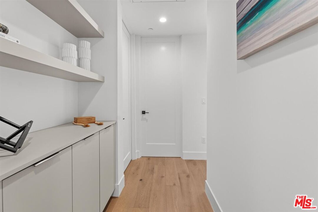 1573 Hi Point Street Los Angeles, CA 90035 - Photo 41 of 56 a room with storage and utility