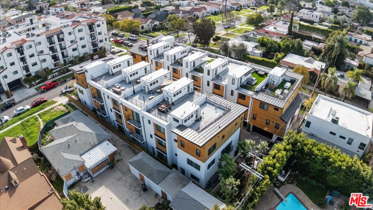 1573 Hi Point Street Los Angeles, CA 90035 - Photo 56 of 56 an aerial view of multiple houses with yard