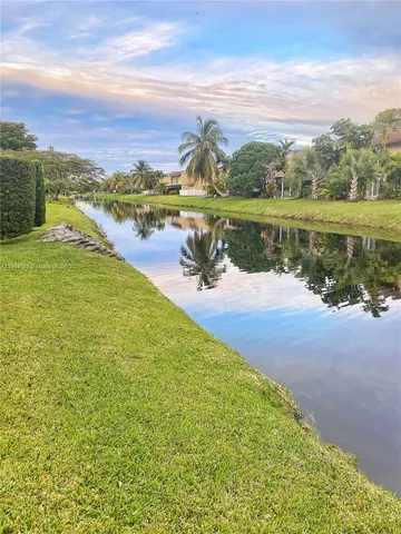 a view of a lake with a city