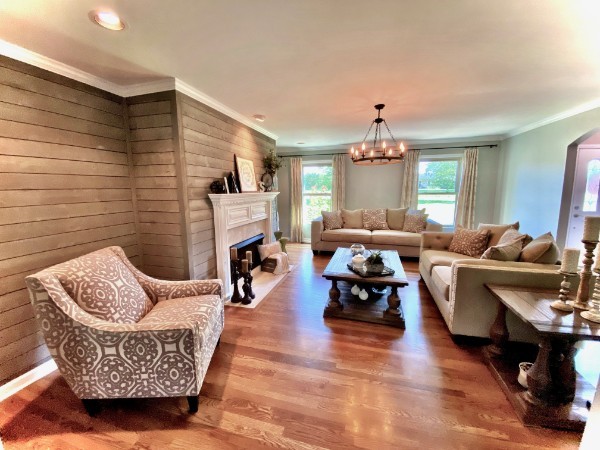 7404 Hoods Branch Road Springfield, TN 37172 - Photo 14 of 50 a living room with furniture and a chandelier