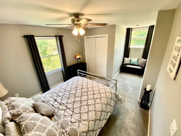 7404 Hoods Branch Road Springfield, TN 37172 - Photo 27 of 50 a bedroom with a bed and a mirror