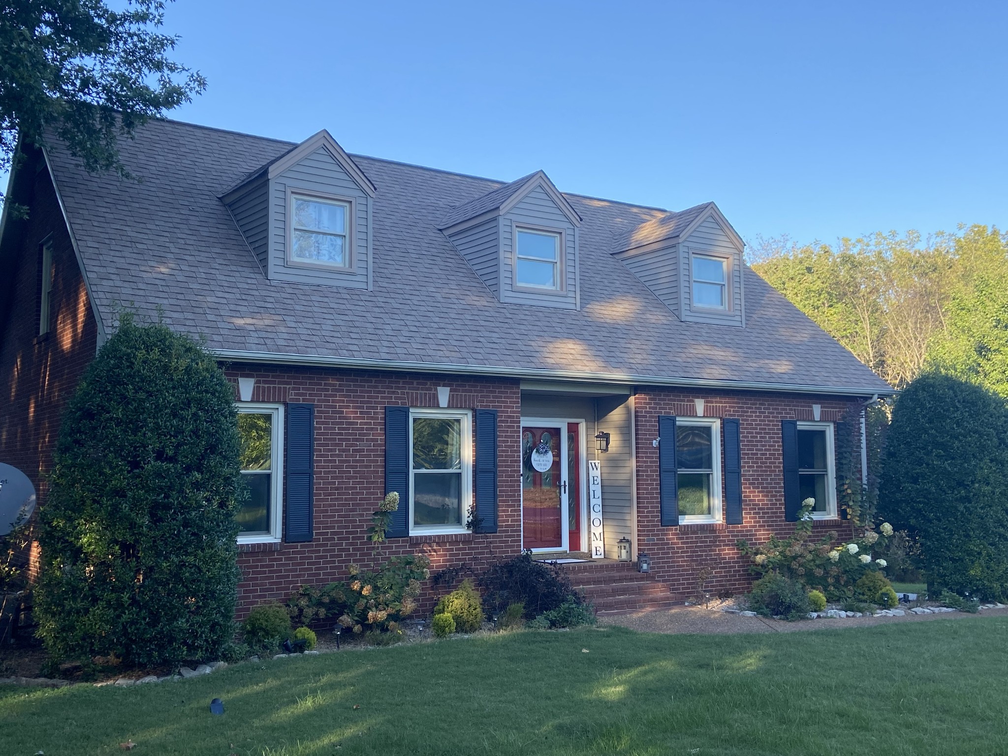 7404 Hoods Branch Road Springfield, TN 37172 - Photo 4 of 50 a front view of a house with garden