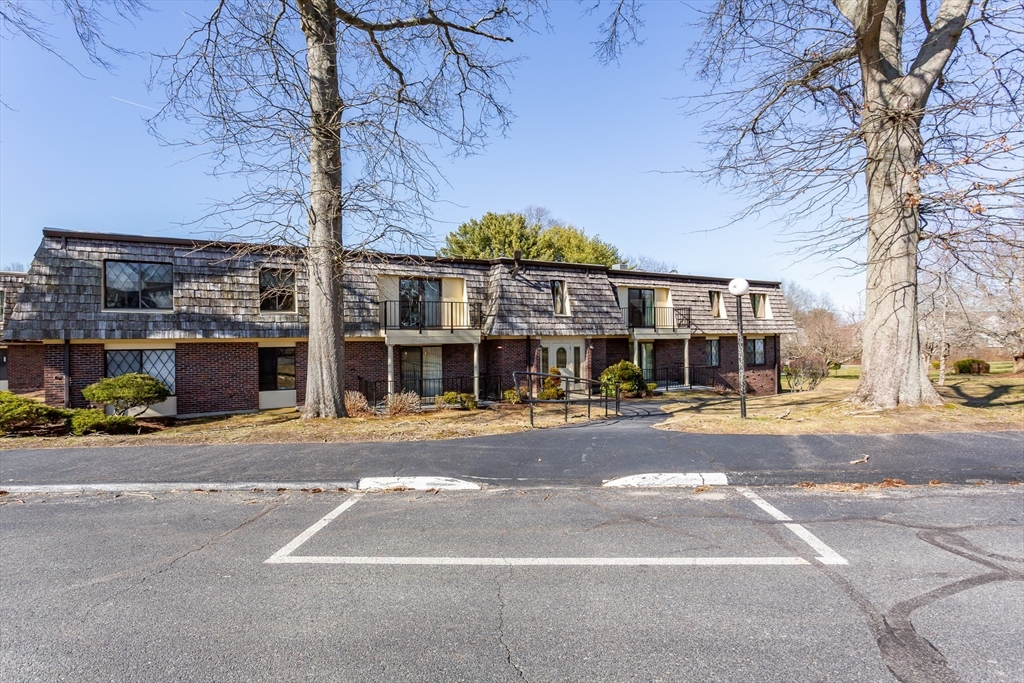4700 North Main Street, Unit 1K Fall River, MA 02720 - Photo 17 of 18 a view of a large building next to a road