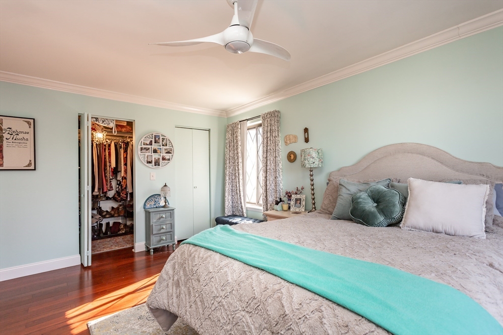 4700 North Main Street, Unit 1K Fall River, MA 02720 - Photo 10 of 18 a bedroom with a bed and a walk in closet