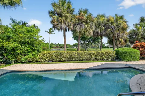 a view of a garden with a fountain