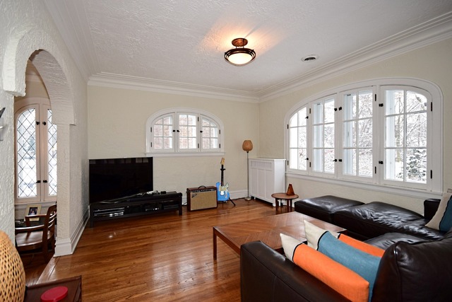 406 Audubon Road Riverside, IL 60546 - Photo 7 of 25 a living room with furniture flat screen tv and windows