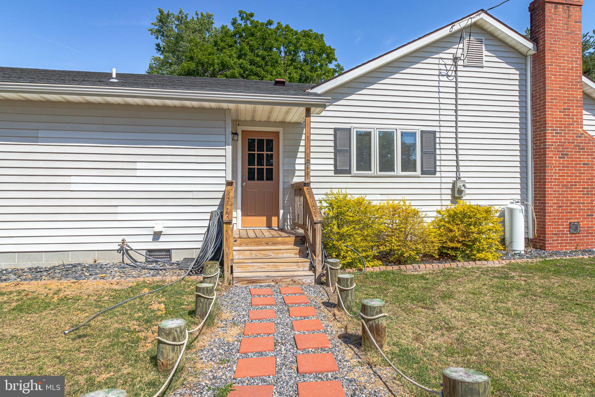 9832 River Road Lancaster, VA 22503 - Photo 62 of 68 Charming entryway with inviting path.