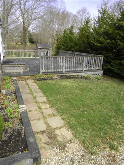 223 Rock Harbor Road, Unit D Orleans, MA 02653 - Photo 2 of 8 a view of a yard