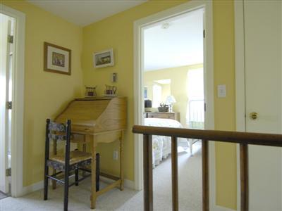 223 Rock Harbor Road, Unit D Orleans, MA 02653 - Photo 8 of 8 a view of a dining room with furniture and a window