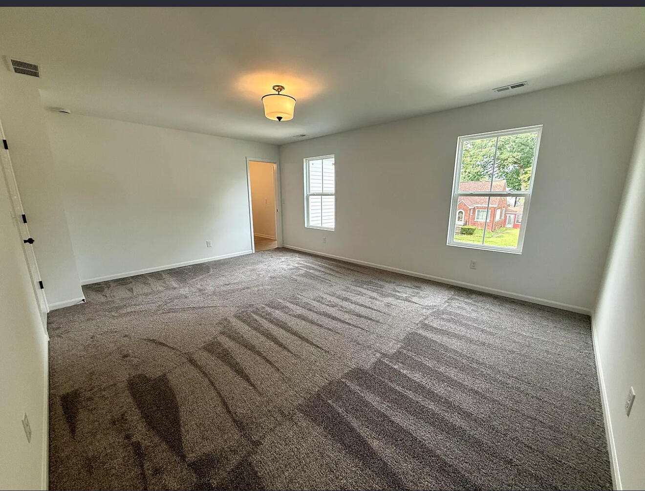 717 Lake Street Hobart, IN 46342 - Photo 19 of 25 an empty room with windows