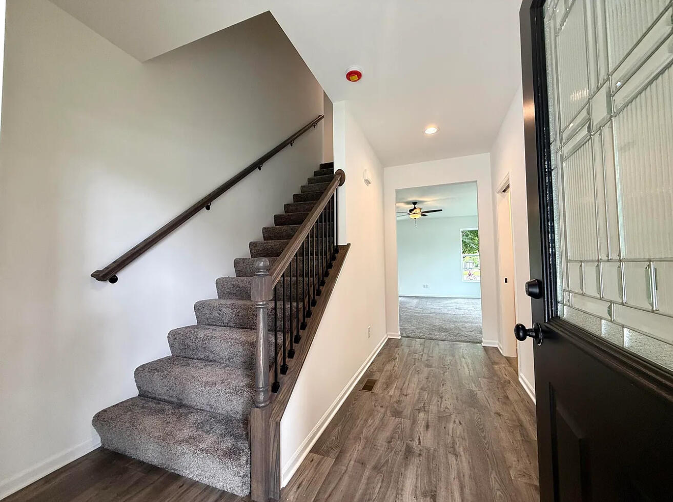 717 Lake Street Hobart, IN 46342 - Photo 3 of 25 a view of entryway and hall with wooden floor